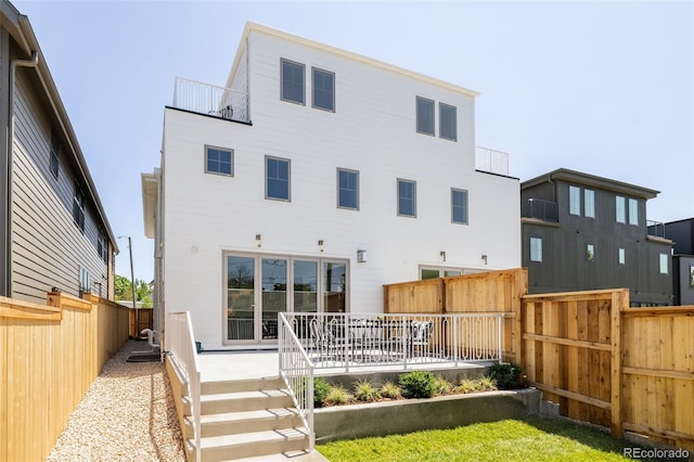 4131 Quivas St, Denver, CO 80211 - rear view of house featuring a fenced backyard