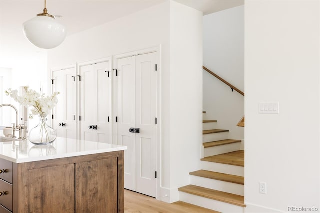 4131 Quivas St, Denver, CO 80211 - mudroom with light wood-style flooring and a sink