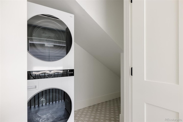 4131 Quivas St, Denver, CO 80211 - laundry room featuring stacked washing machine and dryer and tile patterned floors