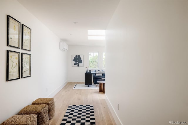 4131 Quivas St, Denver, CO 80211 - hall featuring light wood-style floors and an AC wall unit