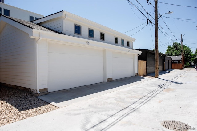 4131 Quivas St, Denver, CO 80211 - garage featuring concrete driveway