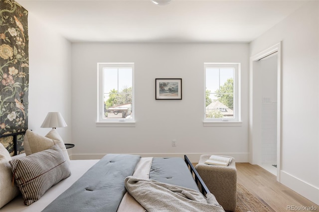 4131 Quivas St, Denver, CO 80211 - bedroom featuring light wood finished floors and baseboards