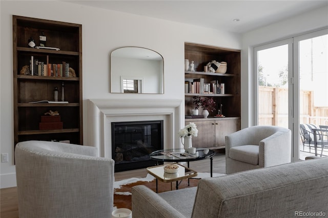 4131 Quivas St, Denver, CO 80211 - living area featuring a glass covered fireplace and wood finished floors