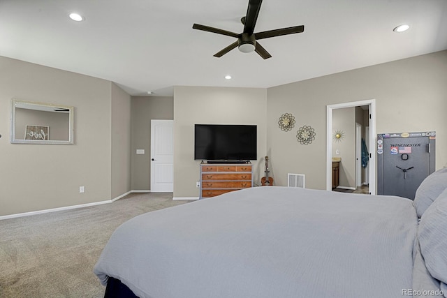 carpeted bedroom with visible vents, baseboards, recessed lighting, a ceiling fan, and connected bathroom