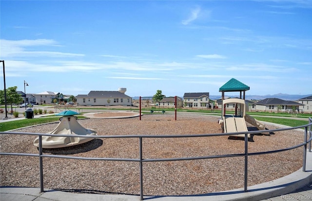3248 Raintree Ln, Dacono, CO 80514 - community jungle gym with a residential view