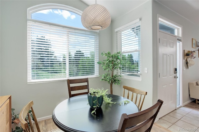 dining room featuring baseboards
