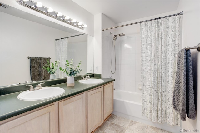 bathroom with double vanity, visible vents, a sink, and shower / tub combo with curtain