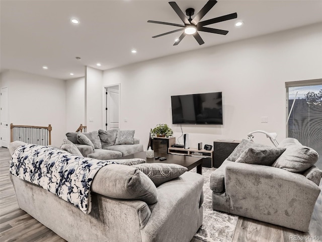 living area with recessed lighting, wood finished floors, and ceiling fan