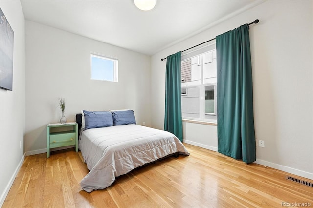1376 Snowberry Ln, Louisville, CO 80027 - bedroom with light wood-style flooring and baseboards