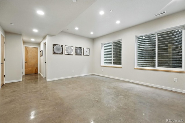 1376 Snowberry Ln, Louisville, CO 80027 - empty room featuring finished concrete flooring and recessed lighting