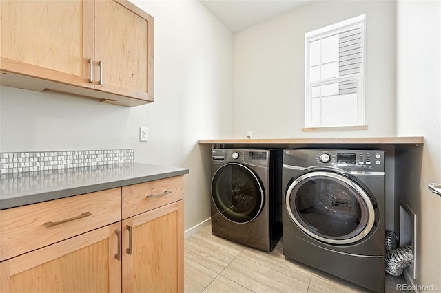 1376 Snowberry Ln, Louisville, CO 80027 - washroom with washing machine and clothes dryer and cabinet space