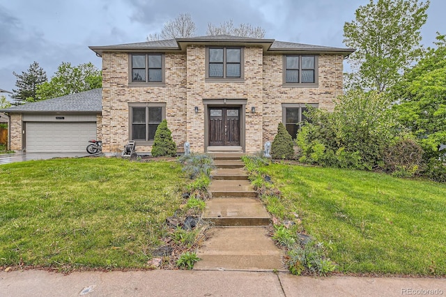 view of front of house with a garage, a front lawn, brick siding, and french doors