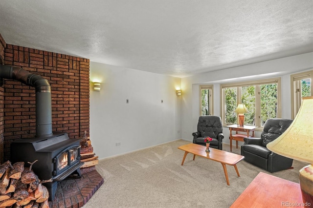 carpeted living room with a textured ceiling and a wood stove