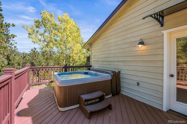 deck featuring a hot tub