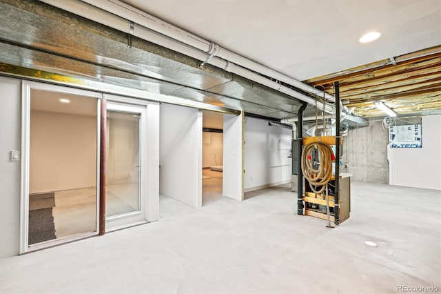 basement featuring heating unit