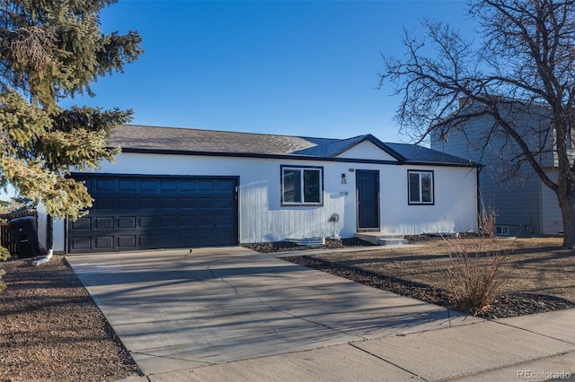 ranch-style home with a garage