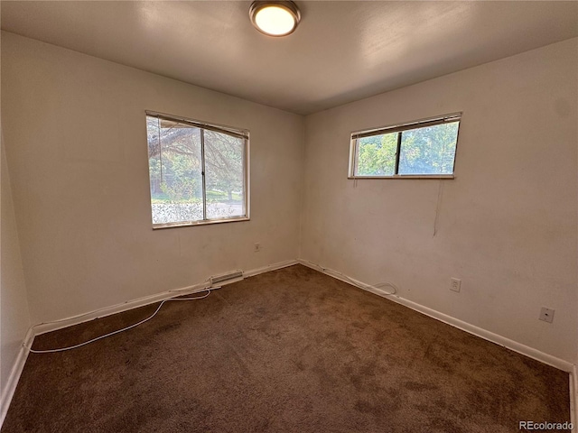 view of carpeted spare room