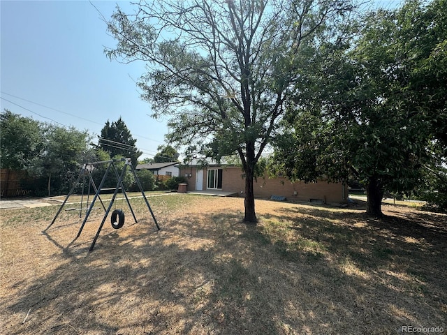 view of yard featuring a playground