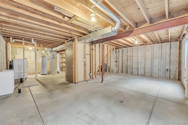 8479 Rabbitbrush Way, Parker, CO 80134 - unfinished basement featuring water heater and washer / dryer