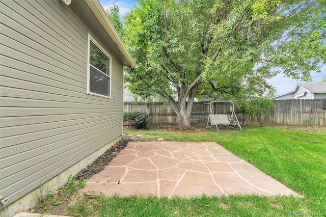 8479 Rabbitbrush Way, Parker, CO 80134 - fenced backyard with a patio