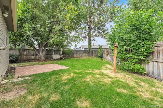 8479 Rabbitbrush Way, Parker, CO 80134 - fenced backyard featuring a patio