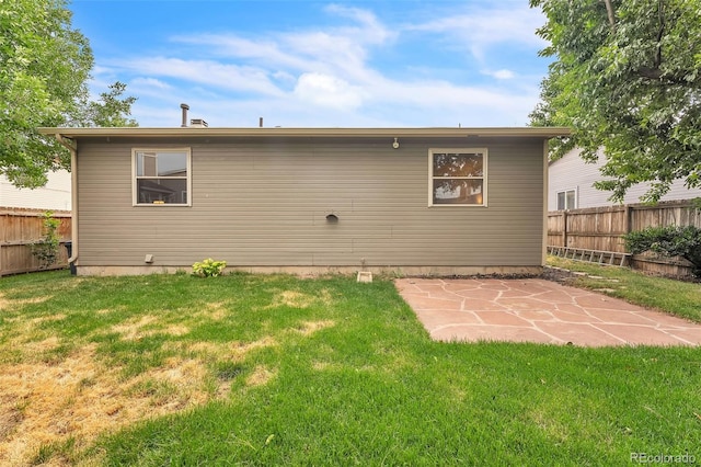 8479 Rabbitbrush Way, Parker, CO 80134 - back of house with a patio area