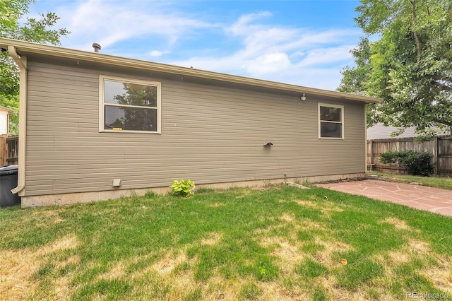 8479 Rabbitbrush Way, Parker, CO 80134 - rear view of property featuring a patio area