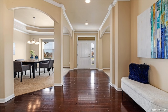 27235 E Lakeview Pl, Aurora, CO 80016 - foyer with arched walkways, hardwood / wood-style floors, recessed lighting, a chandelier, and crown molding