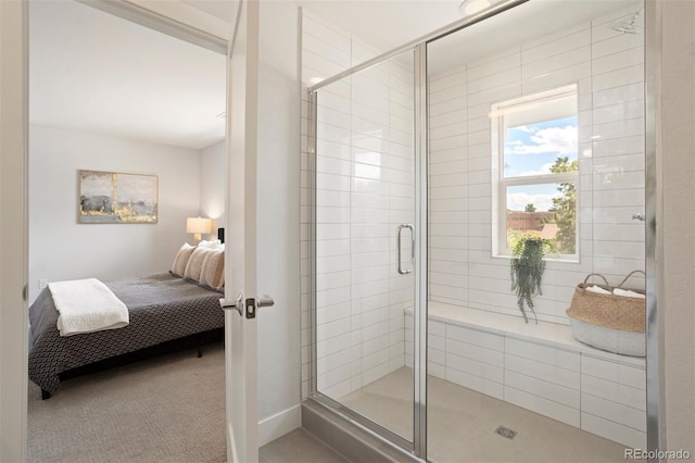 ensuite bathroom with ensuite bath and a stall shower
