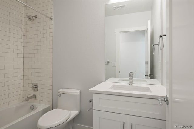 bathroom with toilet, vanity, bathing tub / shower combination, and visible vents