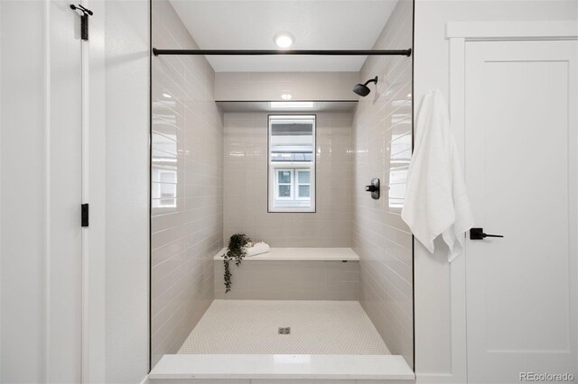 4020 Upham St, Wheat Ridge, CO 80033 - bathroom featuring a tile shower