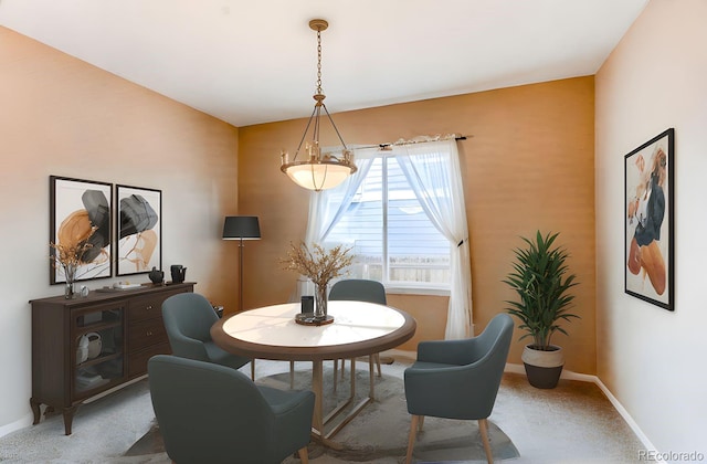 dining room with baseboards