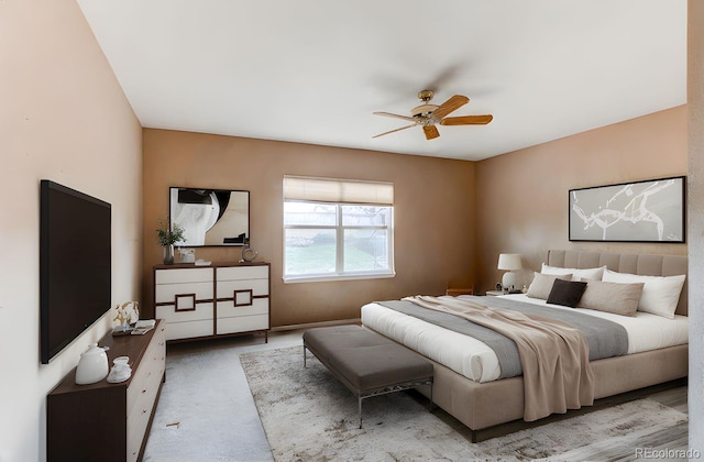 bedroom featuring carpet floors and ceiling fan