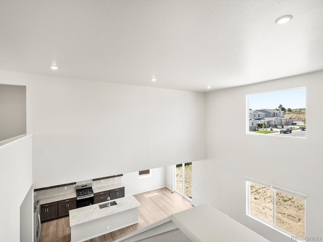 1612 Colorado River Dr, Windsor, CO 80550 - interior space featuring plenty of natural light, wood finished floors, recessed lighting, and washer / clothes dryer