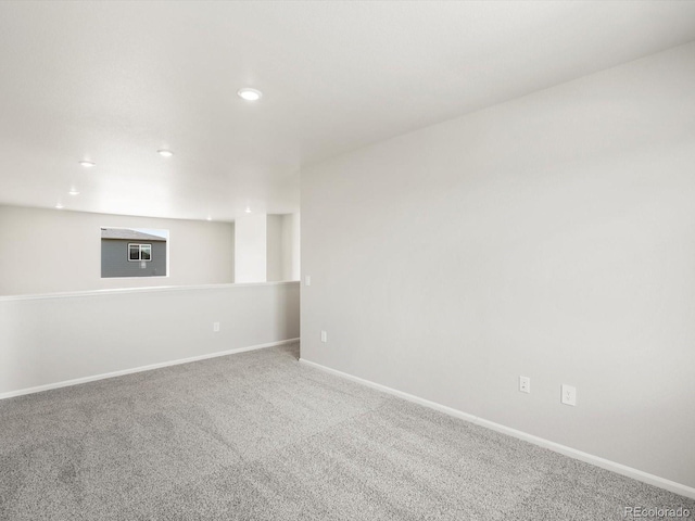 1612 Colorado River Dr, Windsor, CO 80550 - carpeted empty room with recessed lighting and baseboards