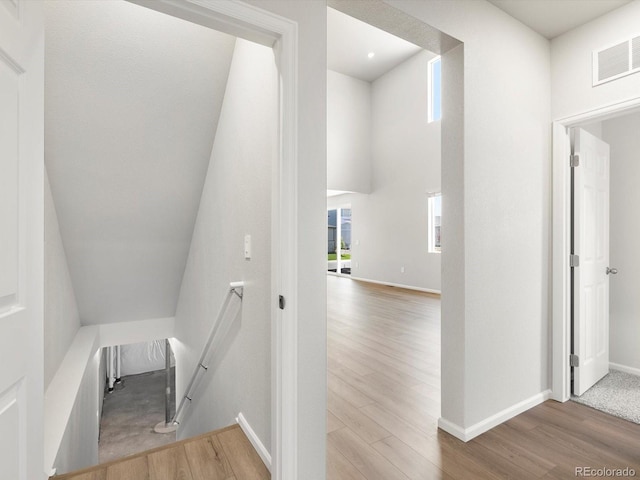 1612 Colorado River Dr, Windsor, CO 80550 - staircase with wood finished floors and baseboards