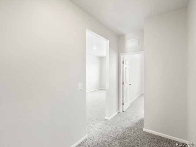 1612 Colorado River Dr, Windsor, CO 80550 - hallway featuring carpet and baseboards