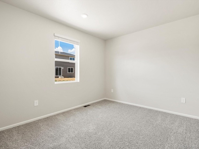 1612 Colorado River Dr, Windsor, CO 80550 - empty room featuring carpet flooring and baseboards
