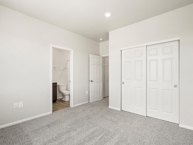 1612 Colorado River Dr, Windsor, CO 80550 - unfurnished bedroom with carpet floors, a closet, connected bathroom, and recessed lighting