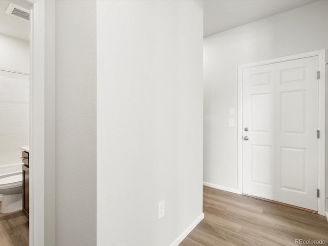 1612 Colorado River Dr, Windsor, CO 80550 - hall with light wood-style floors and baseboards