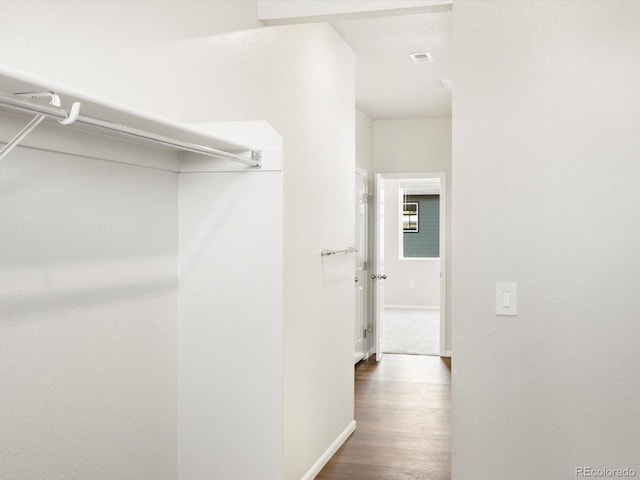 1612 Colorado River Dr, Windsor, CO 80550 - spacious closet featuring wood finished floors