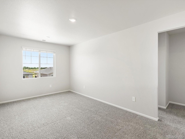 1612 Colorado River Dr, Windsor, CO 80550 - carpeted spare room with baseboards and recessed lighting