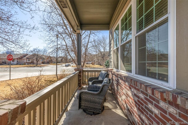 balcony featuring a porch