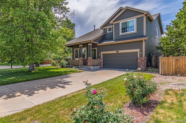 291 Las Lomas St, Brighton, CO 80601 - craftsman house featuring brick siding, concrete driveway, and an attached garage