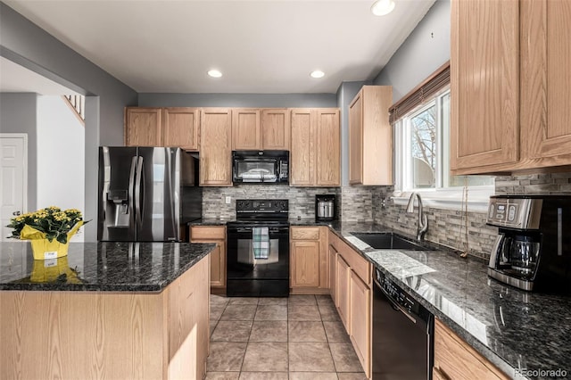 291 Las Lomas St, Brighton, CO 80601 - kitchen featuring black appliances, light brown cabinetry, tasteful backsplash, dark stone countertops, and recessed lighting