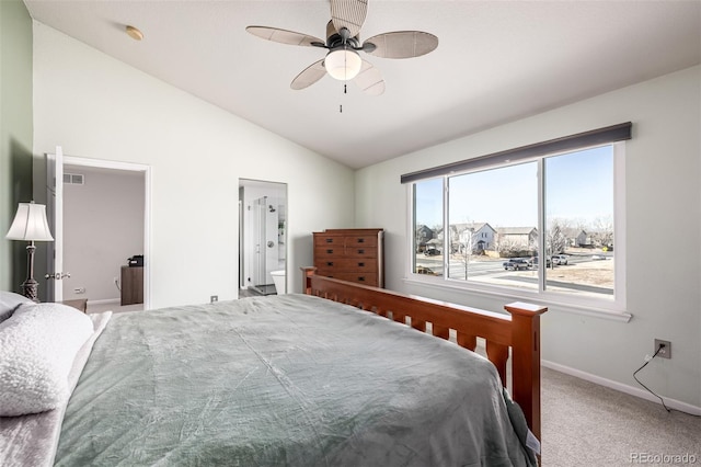 291 Las Lomas St, Brighton, CO 80601 - carpeted bedroom with vaulted ceiling, connected bathroom, and ceiling fan