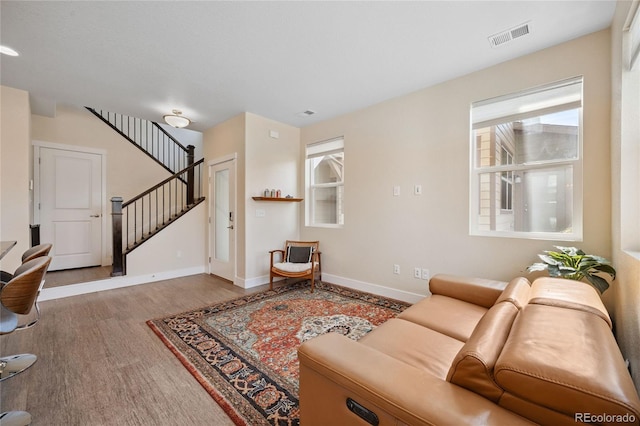 4177 E 98th Pl, Thornton, CO 80229 - living area with wood finished floors and stairway