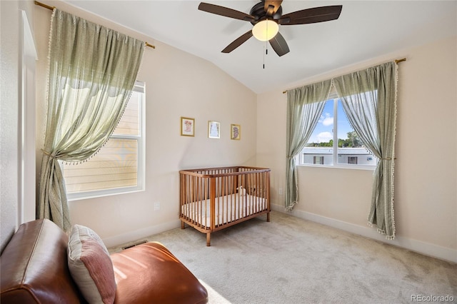 4177 E 98th Pl, Thornton, CO 80229 - carpeted bedroom featuring vaulted ceiling and a ceiling fan