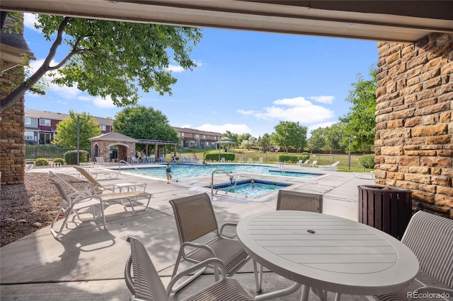 4177 E 98th Pl, Thornton, CO 80229 - community pool with a patio area, a hot tub, and a gazebo