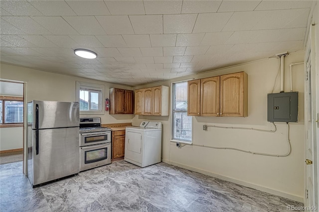 kitchen featuring stainless steel appliances, washer / clothes dryer, and electric panel